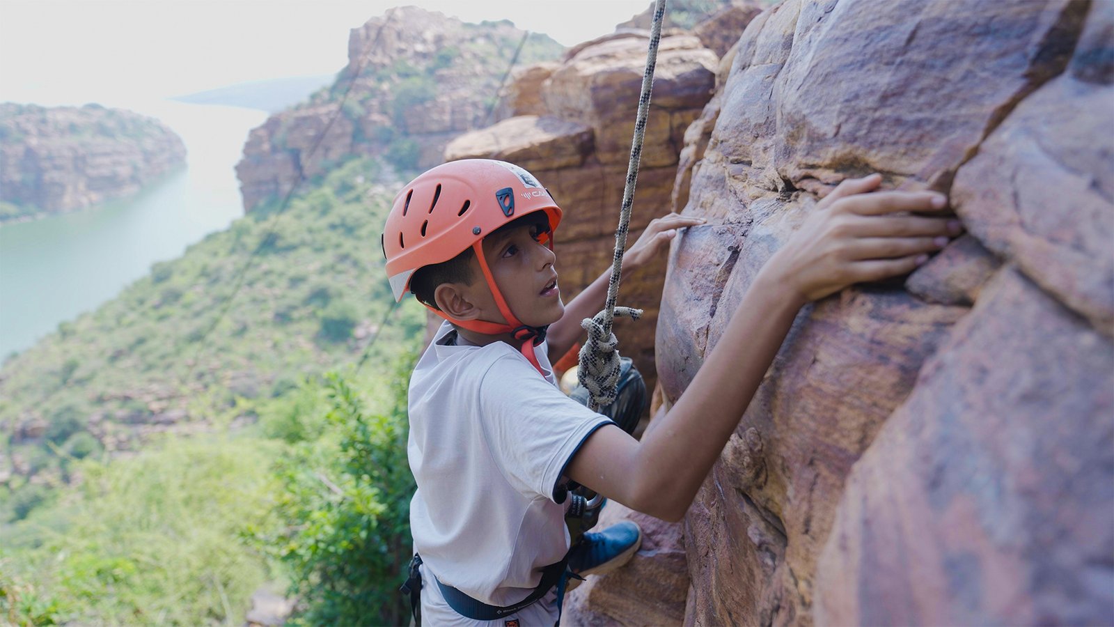Student climbing activity during adventure training program at Gandikota by Adventure Sports Academy of Andhra Pradesh (ASAAP)