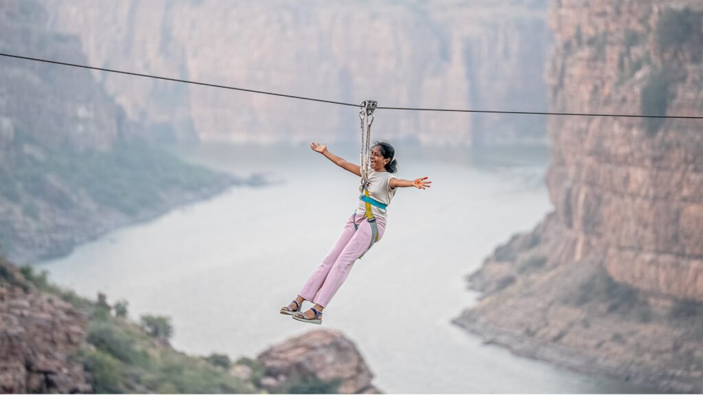 Young girl ziplining at Gandikota during adventure activity with Adventure Sports Academy of Andhra Pradesh (ASAAP)